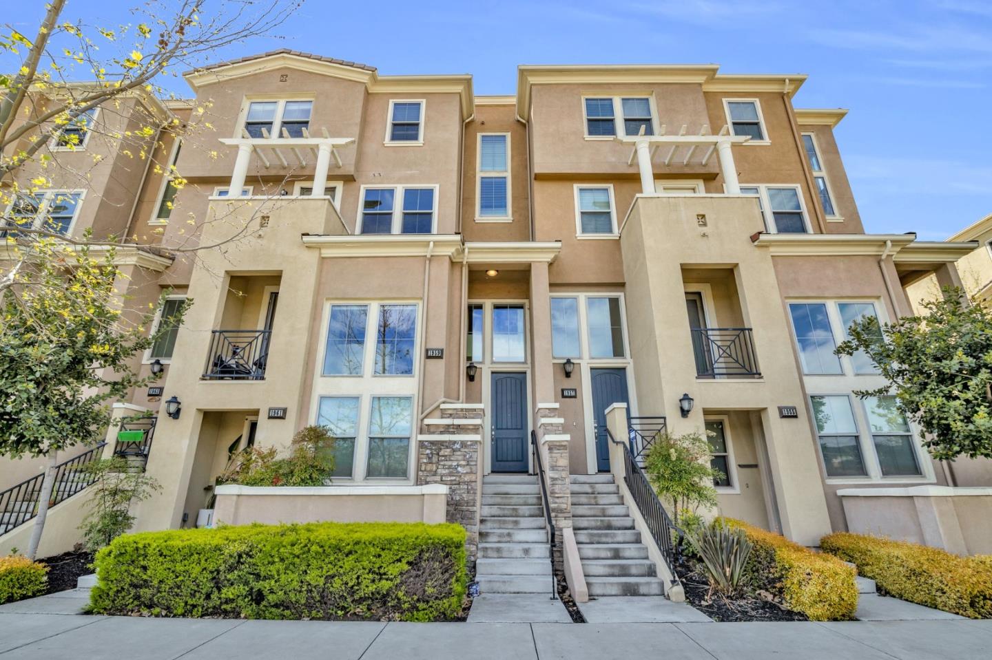 a front view of a multi story residential apartment building