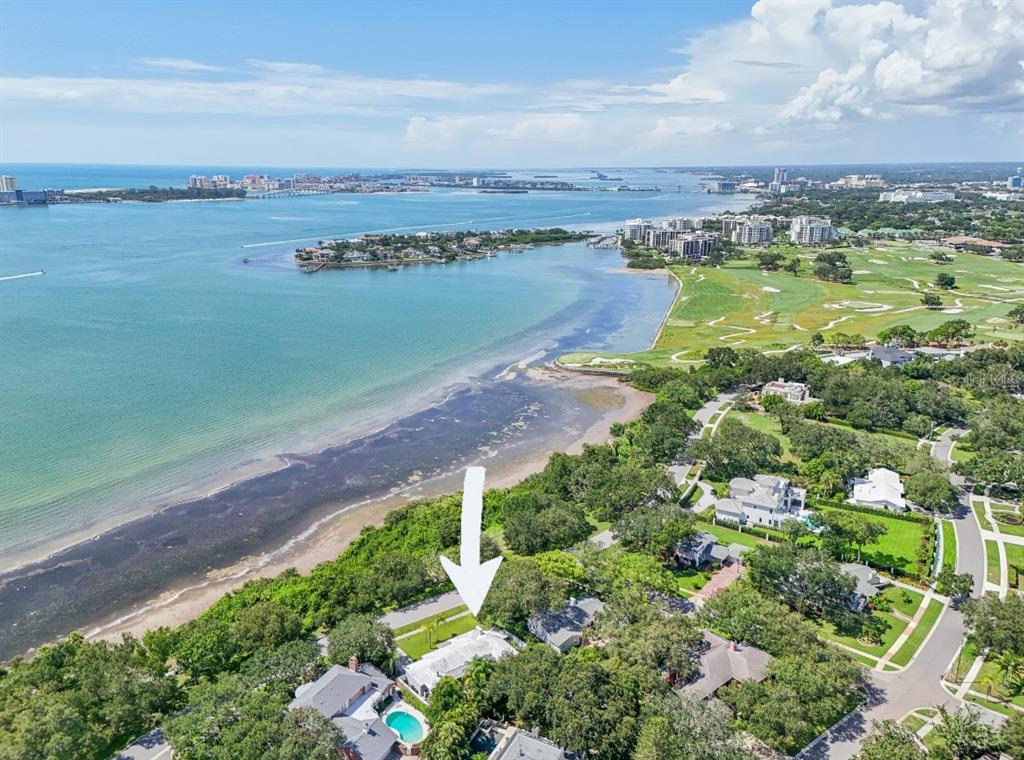 a view of a lake with a yard