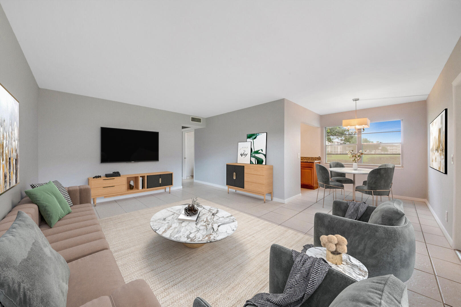 a living room with furniture and a flat screen tv