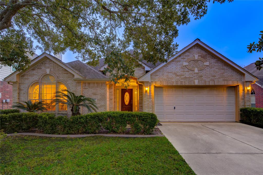 Charming one-story brick home with a welcoming curb appeal. The manicured front lawn, mature landscaping, and classic brick façade make this property stand out in the desirable Windstone Colony neighborhood.