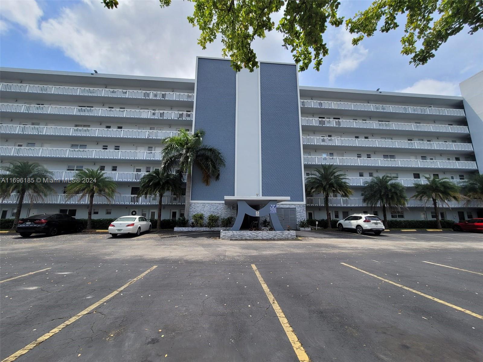 a view of a cars parked in front of a building