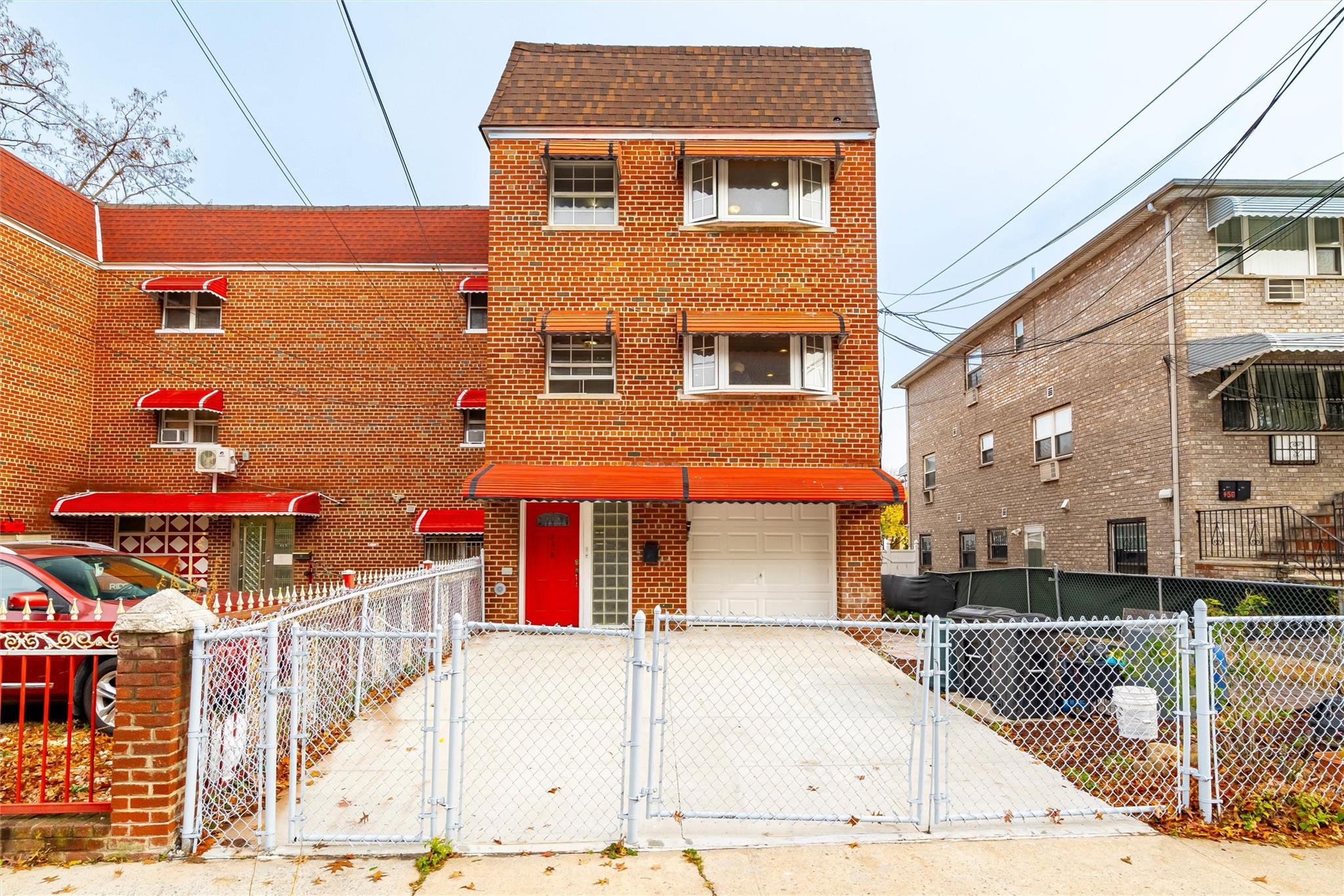 View of front of home featuring a garage