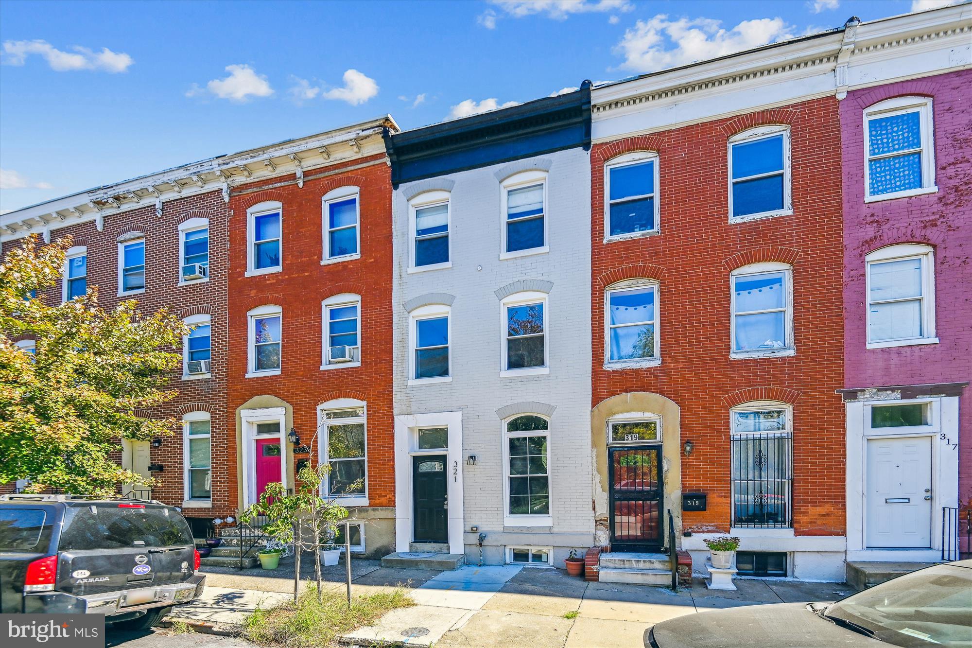 a front view of a multi story residential apartment building