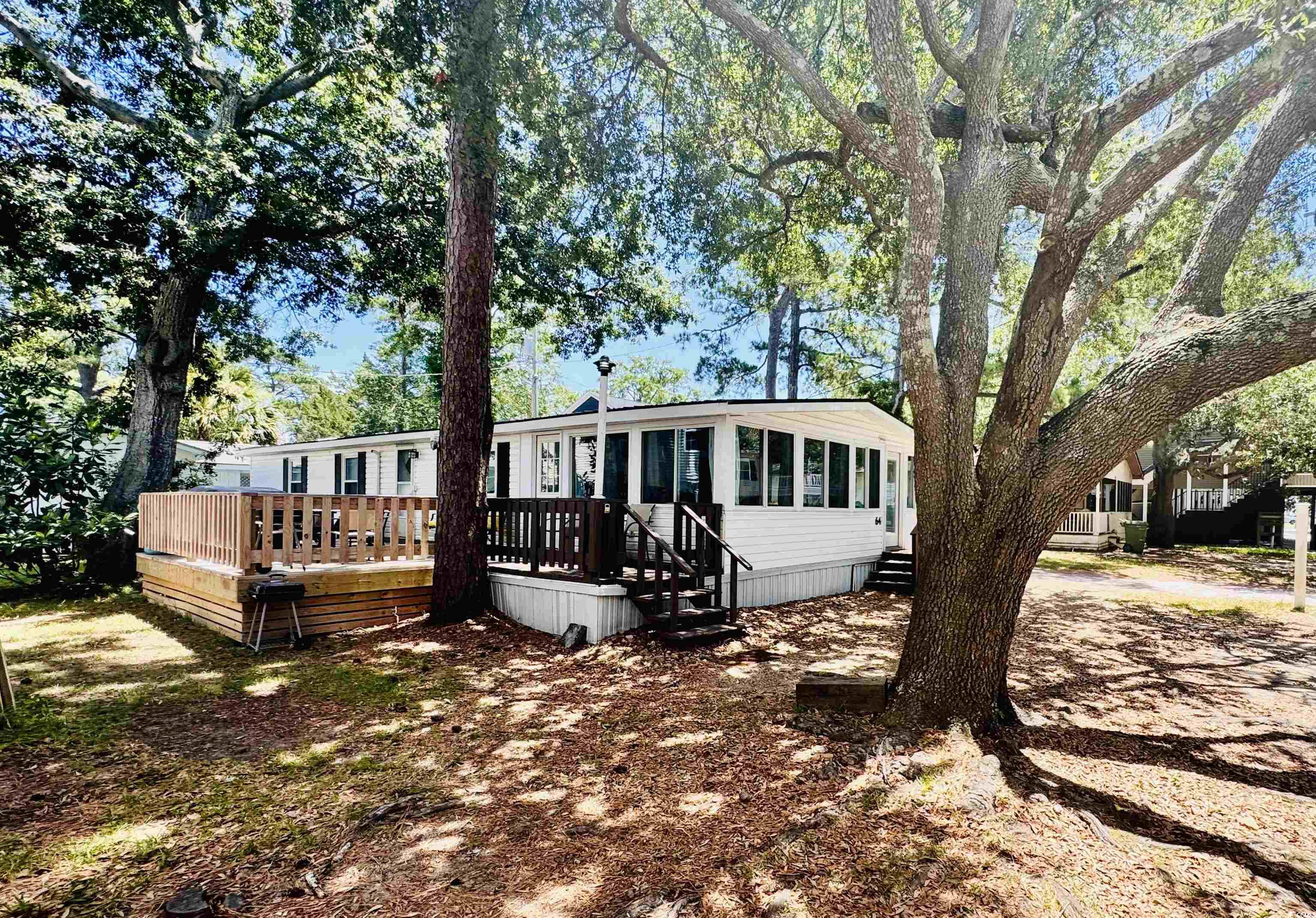 View of front of property featuring a deck