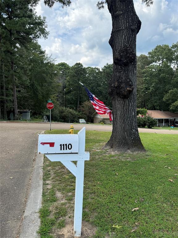 a view of a park with welcome board