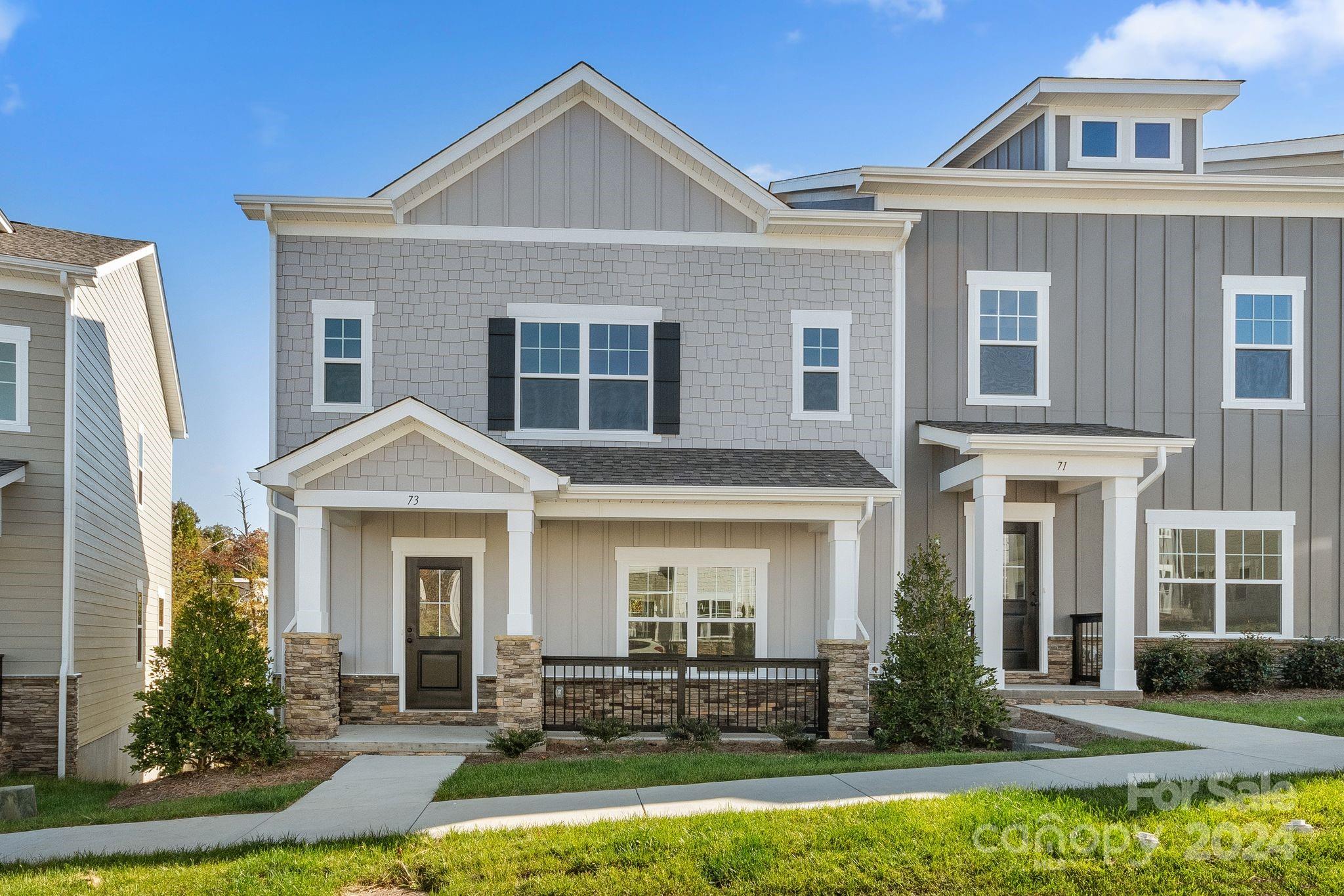 front view of a house with a yard