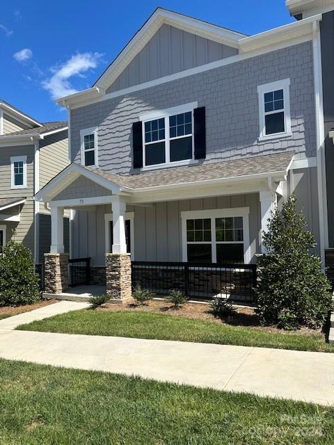 a front view of a house with yard