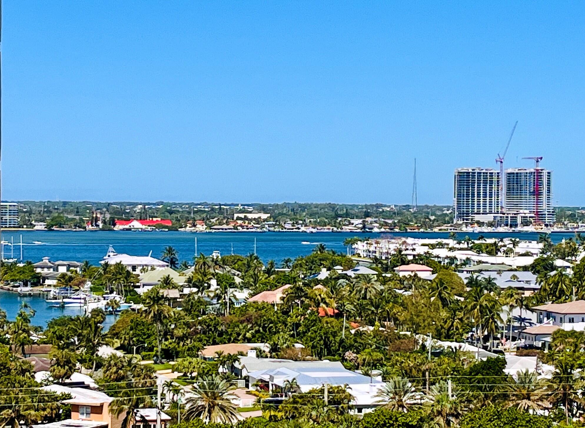 a view of a lake with a city