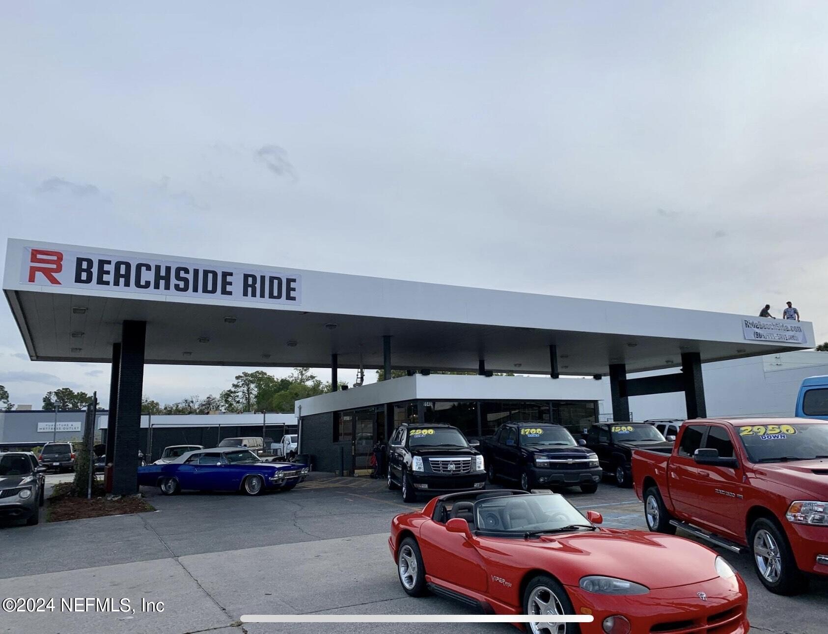 a garage with cars parked