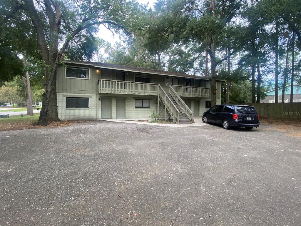 a view of car parked in front of house