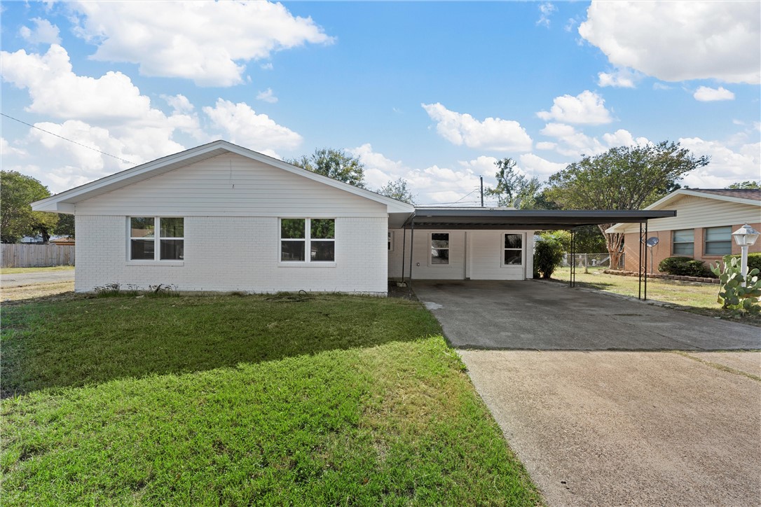 front view of a house and a yard