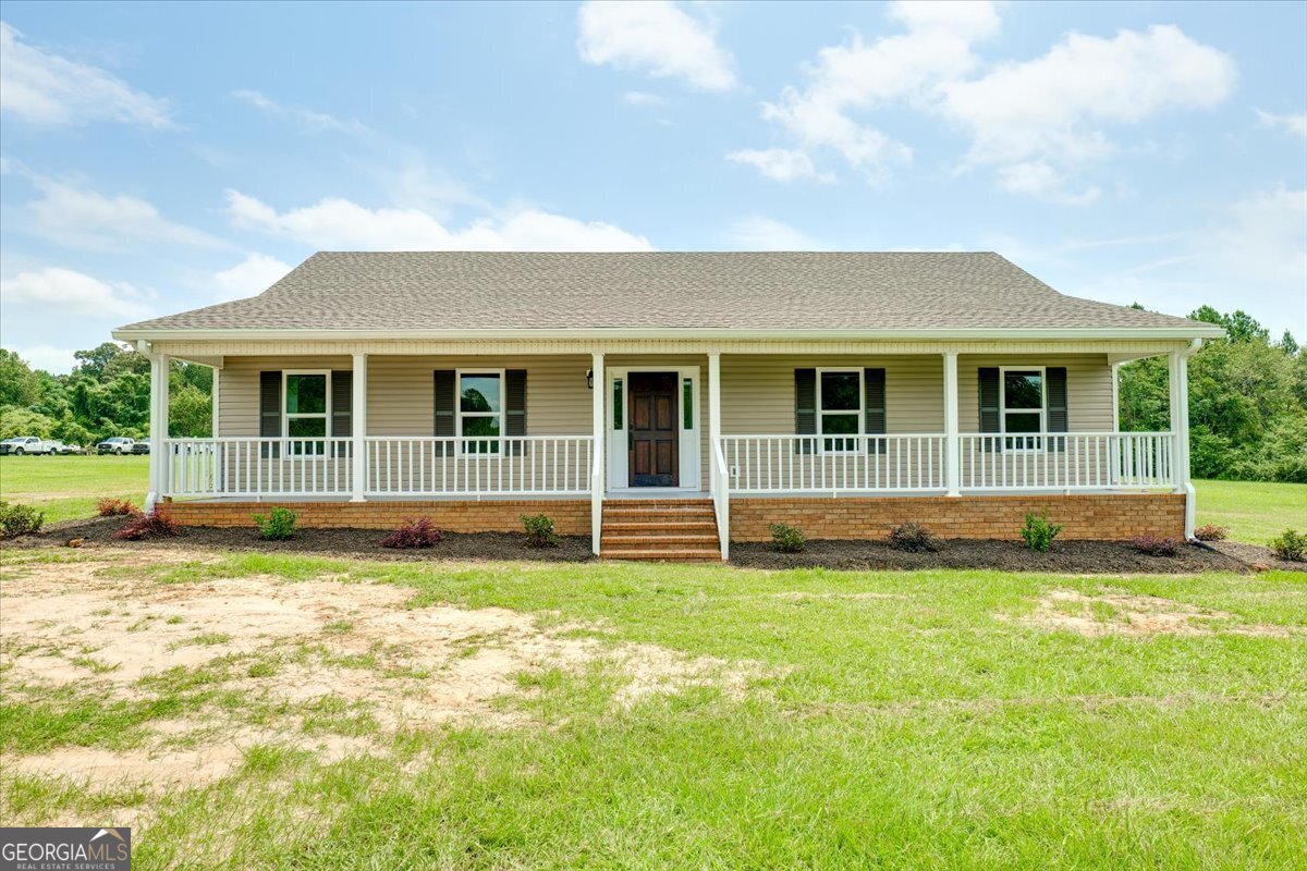 a view of a house with a swimming pool