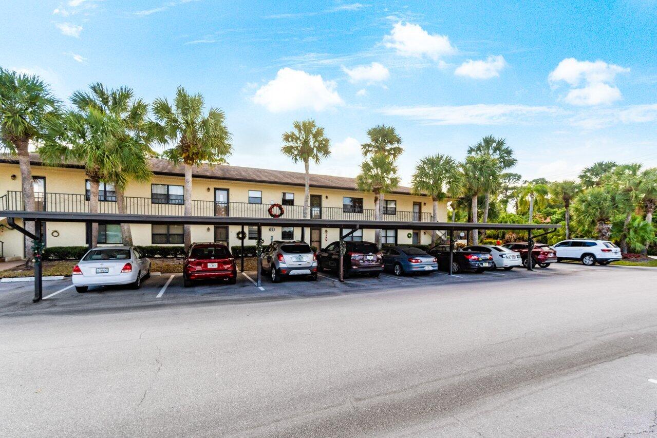 a view of a cars parked in front of a building