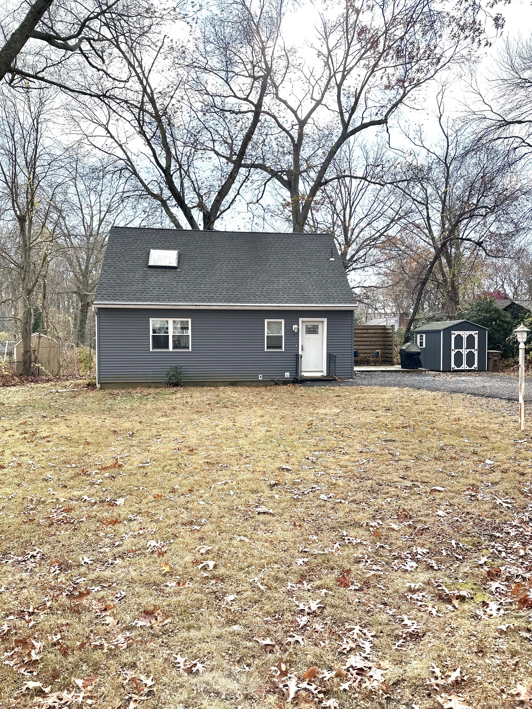 a house with trees in front of it