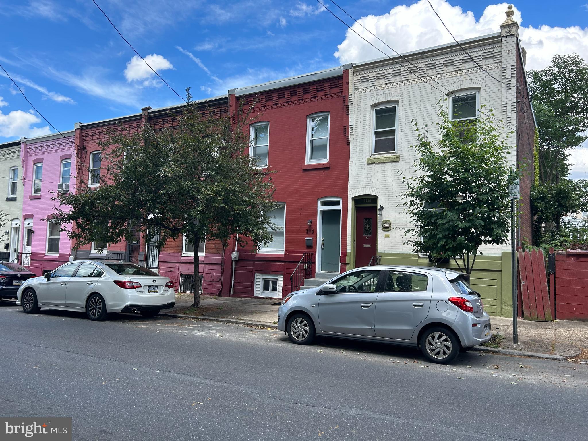 a car parked in front of a house