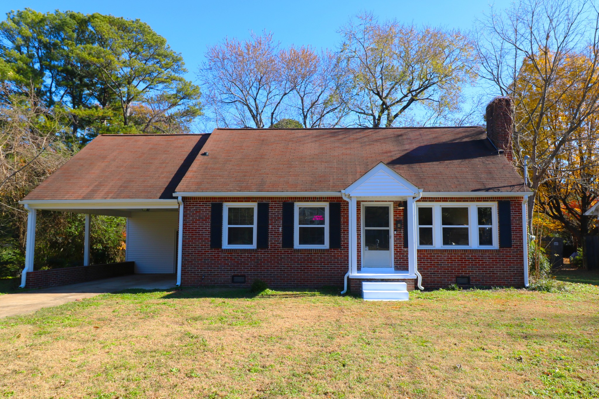 front view of a house with a yard