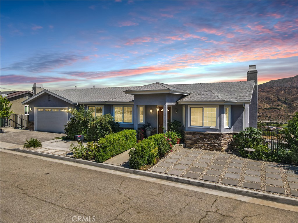 front view of house with a yard