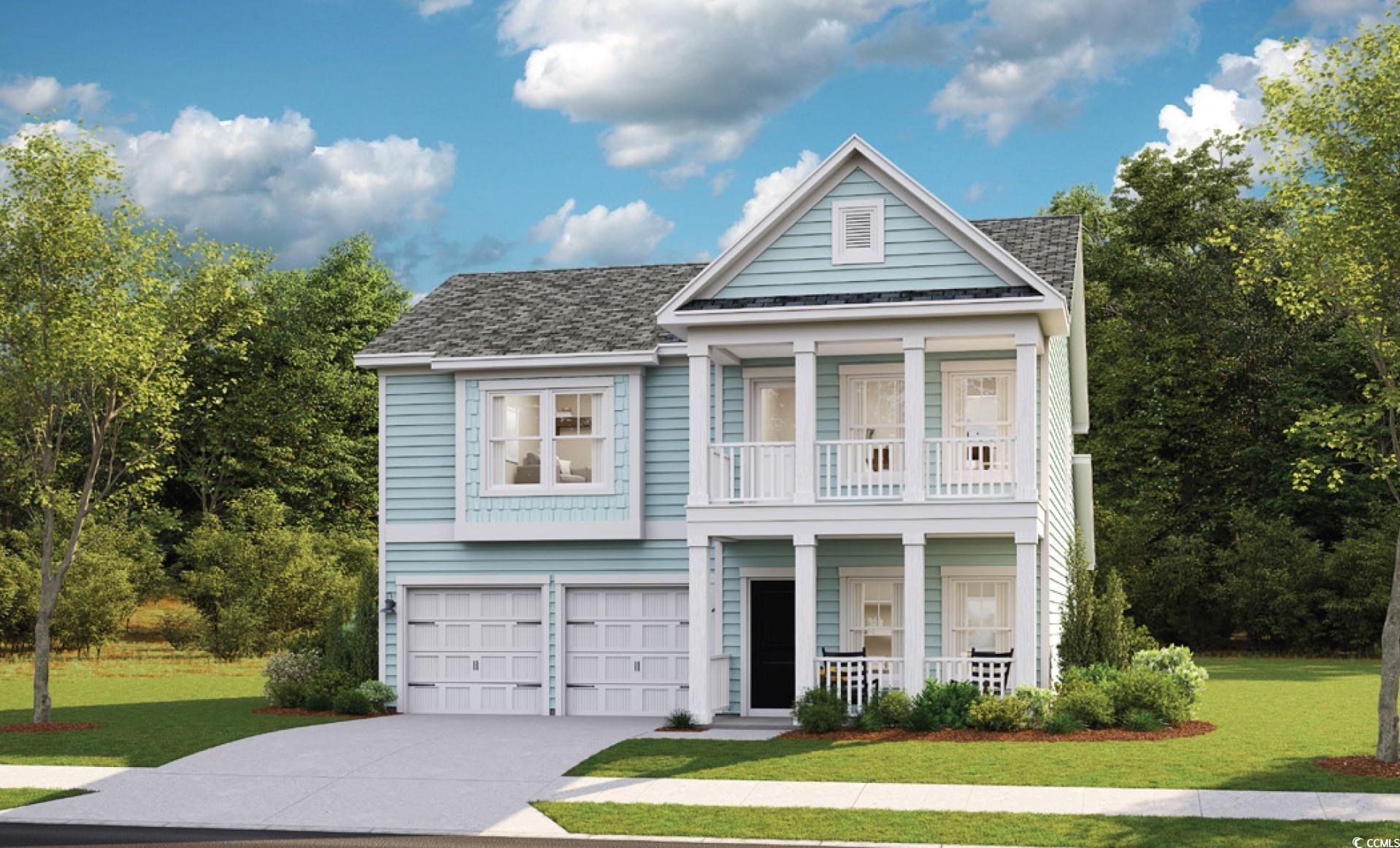 View of front of home featuring covered porch, a g