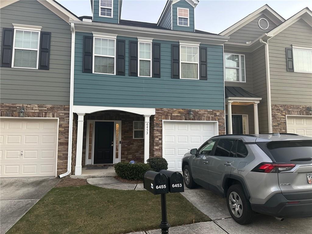 a car parked in front of a house