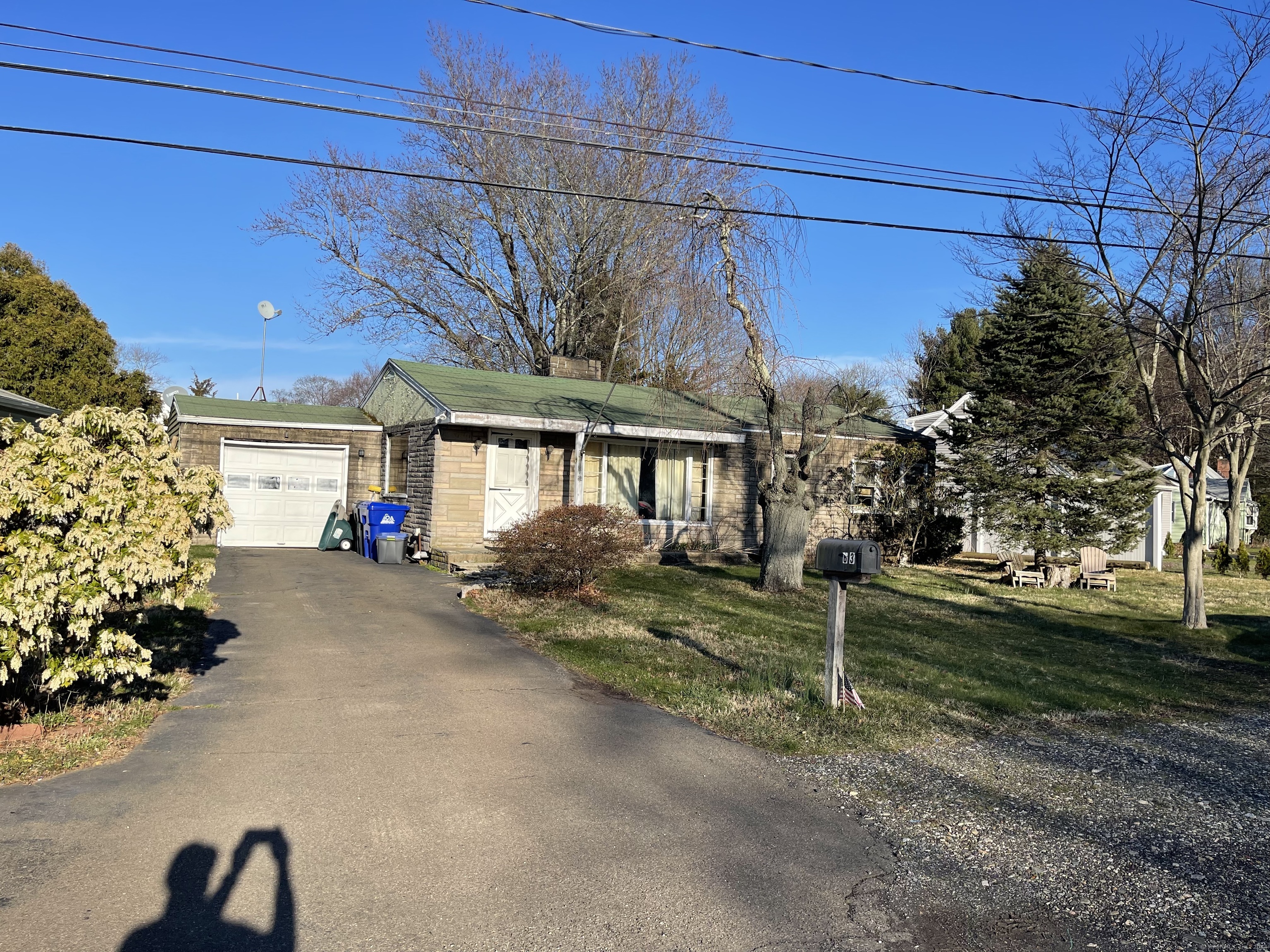 a view of a house with a street