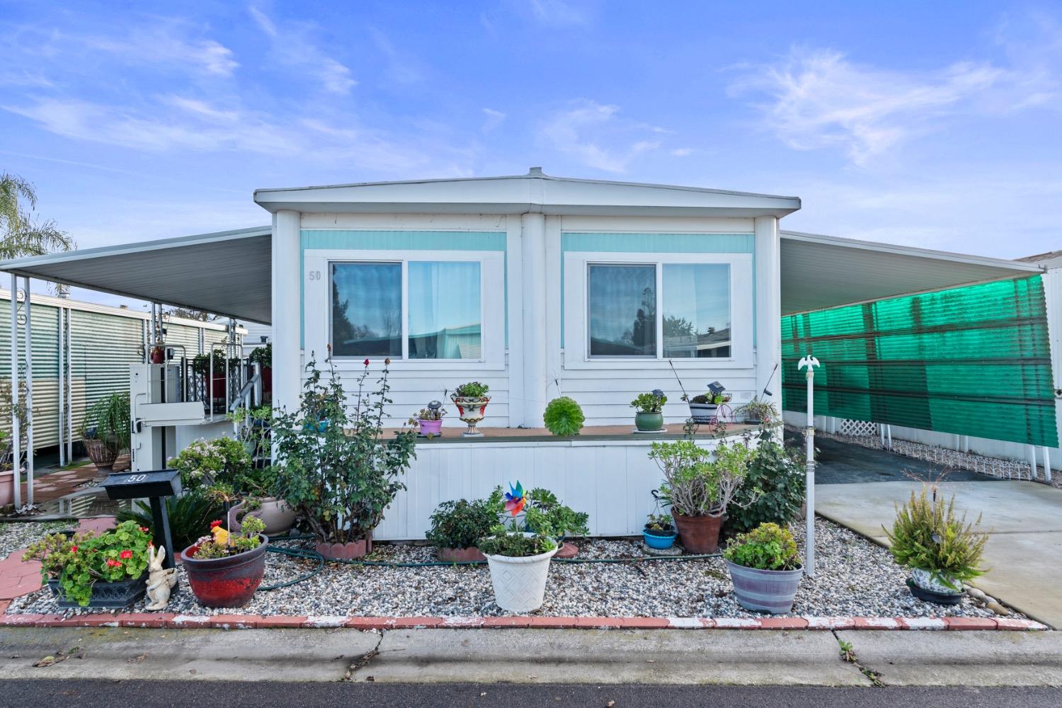 a front view of a house with porch