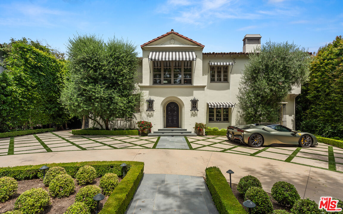 a view of a house with a swimming pool