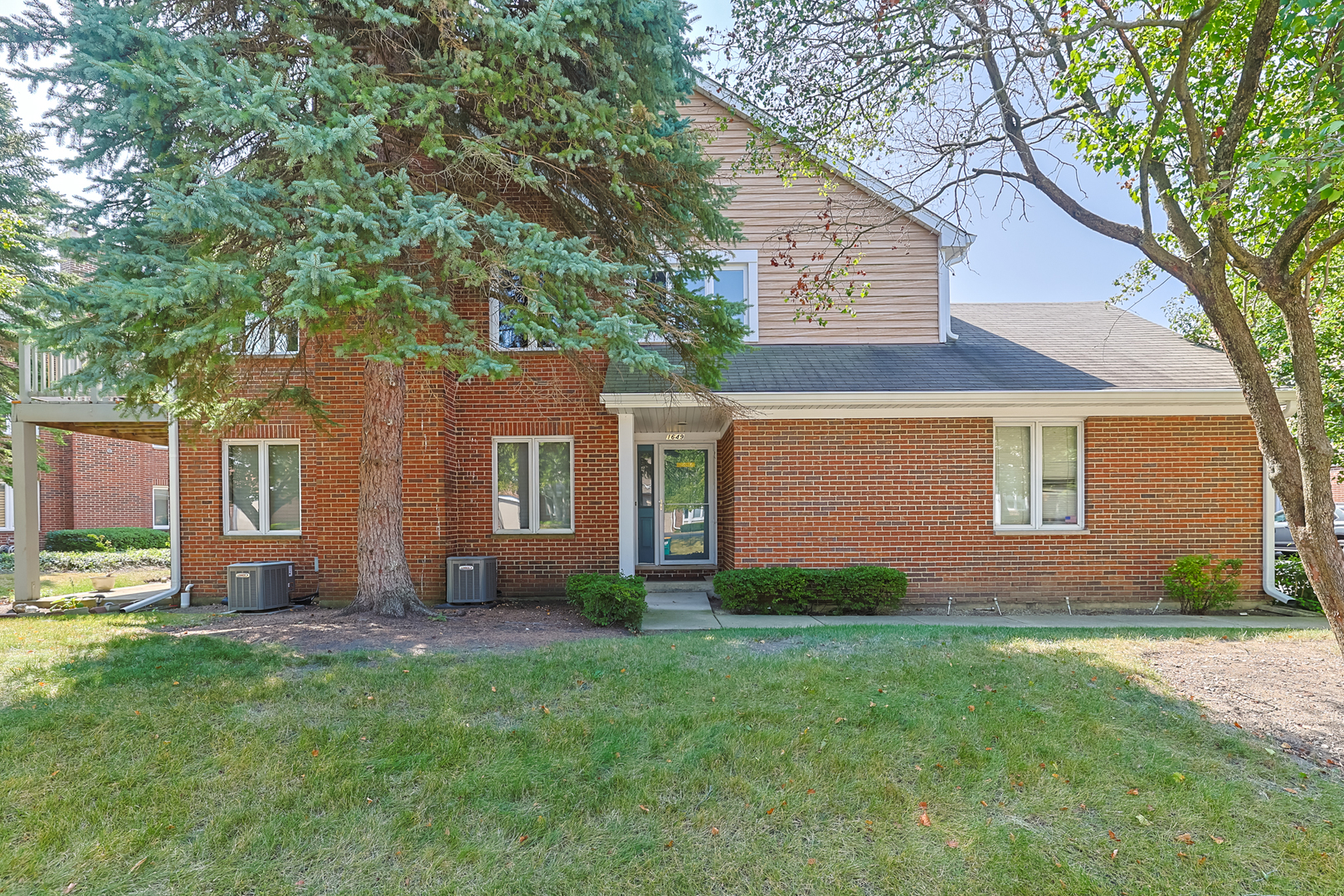 a front view of house with yard