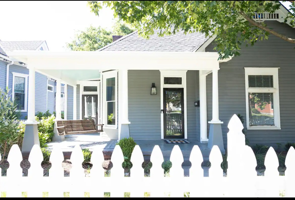 a front view of a house with a glass door