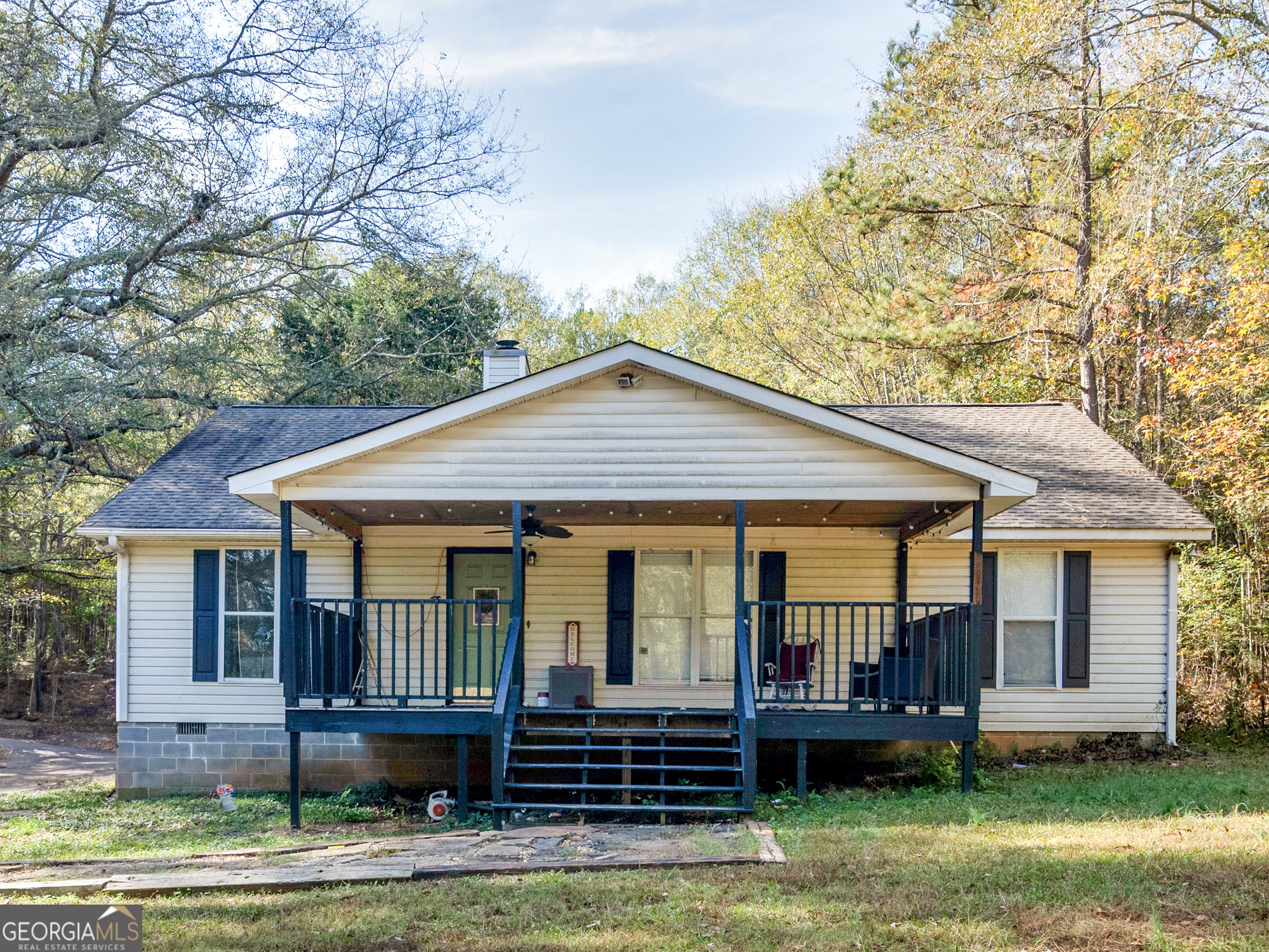 front view of a house with a yard