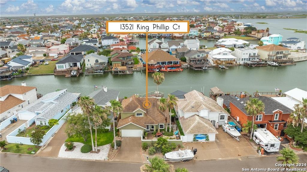 an aerial view of a houses with outdoor space