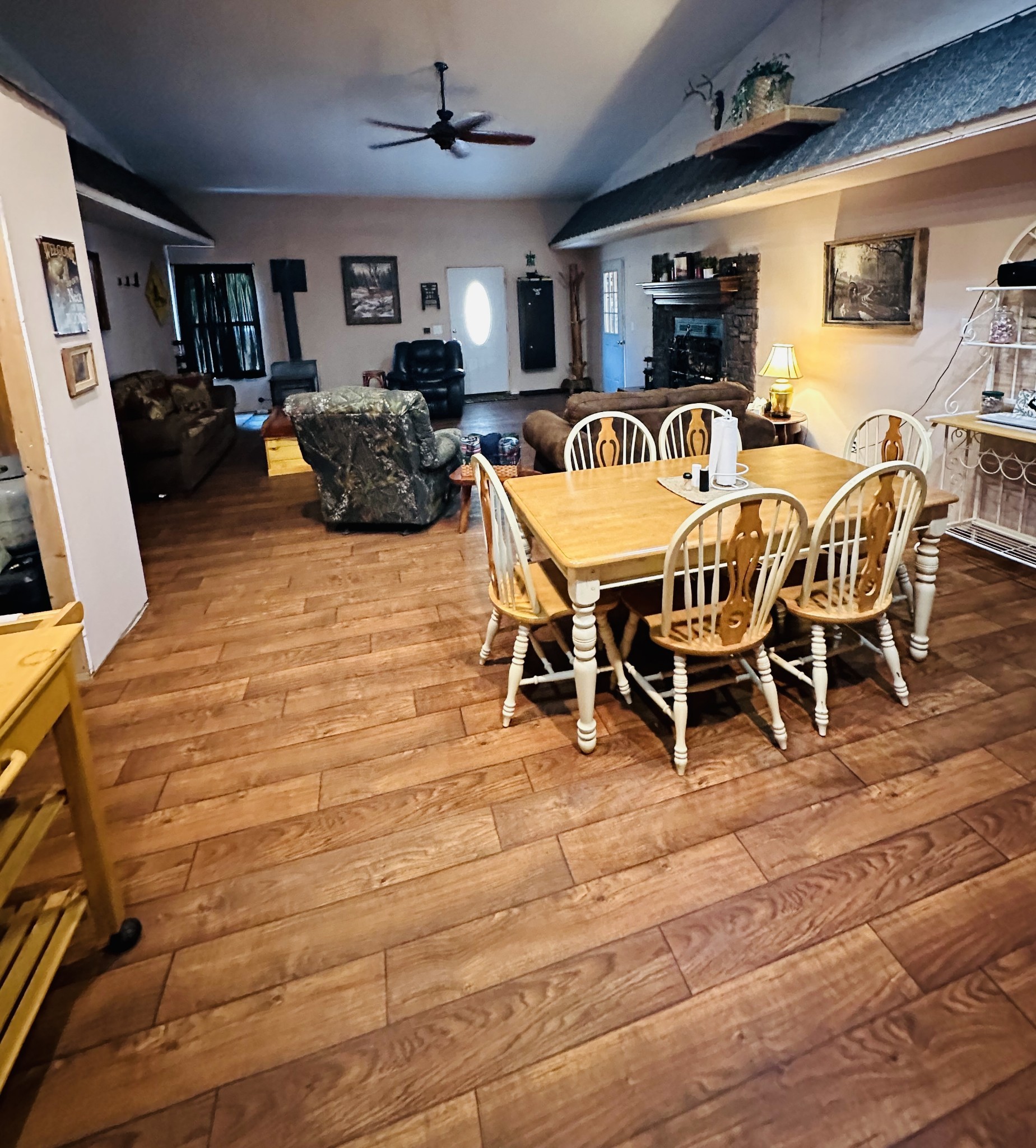 a view of a livingroom with furniture and a flat screen tv