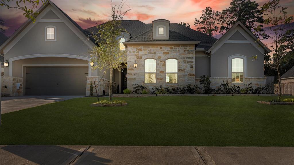 front view of a house with a garden