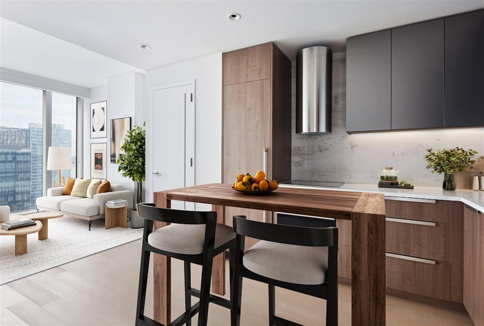 a kitchen with a table chairs sink and cabinets