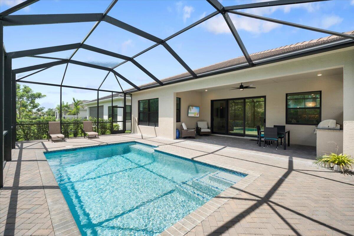 a view of indoor pool and sitting area