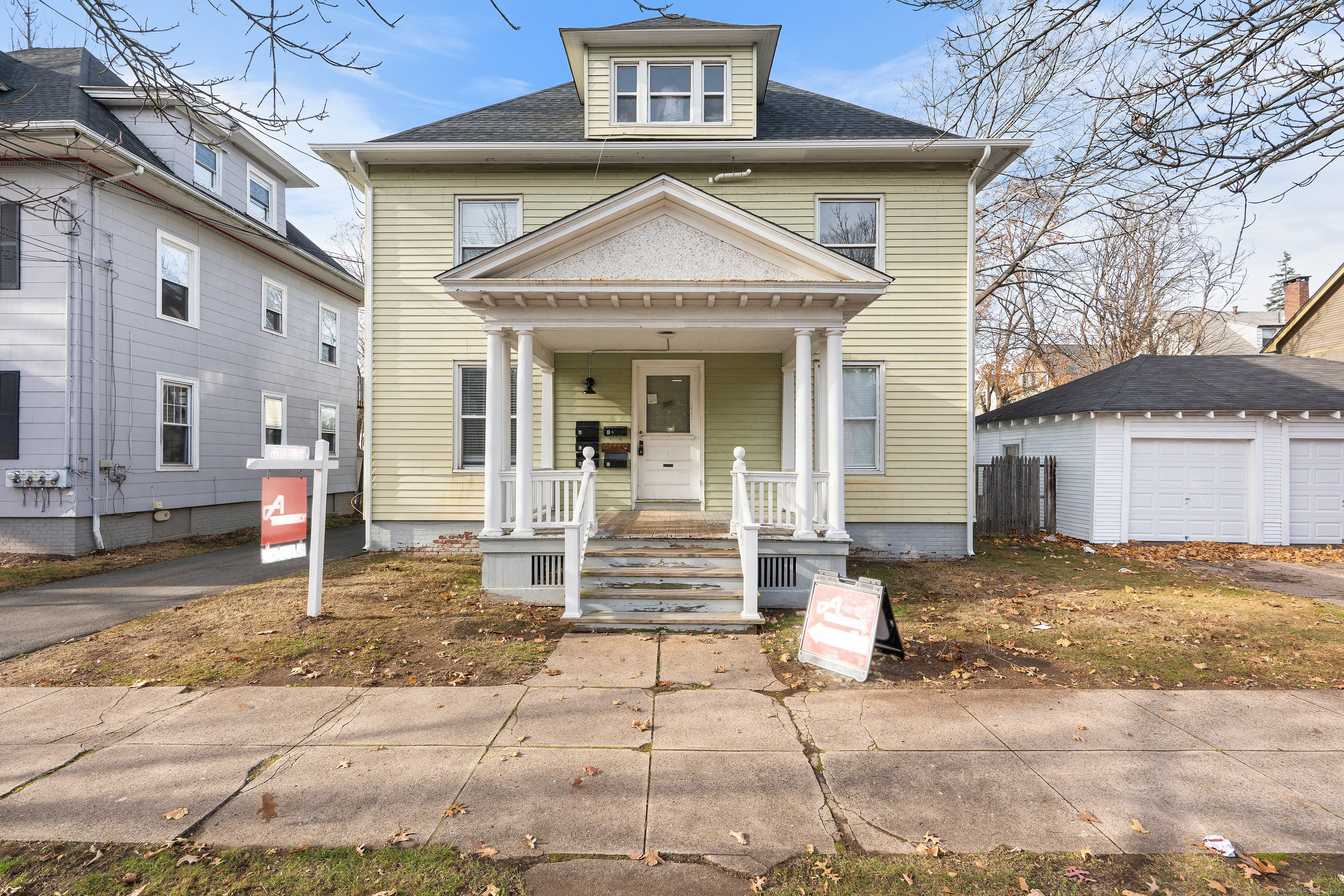 a front view of a house with a view of house