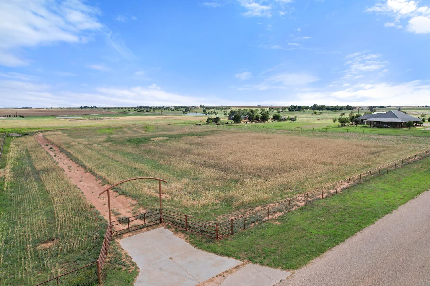 a view of a lake with a big yard