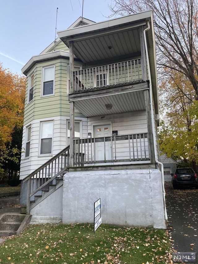 a front view of a house with balcony