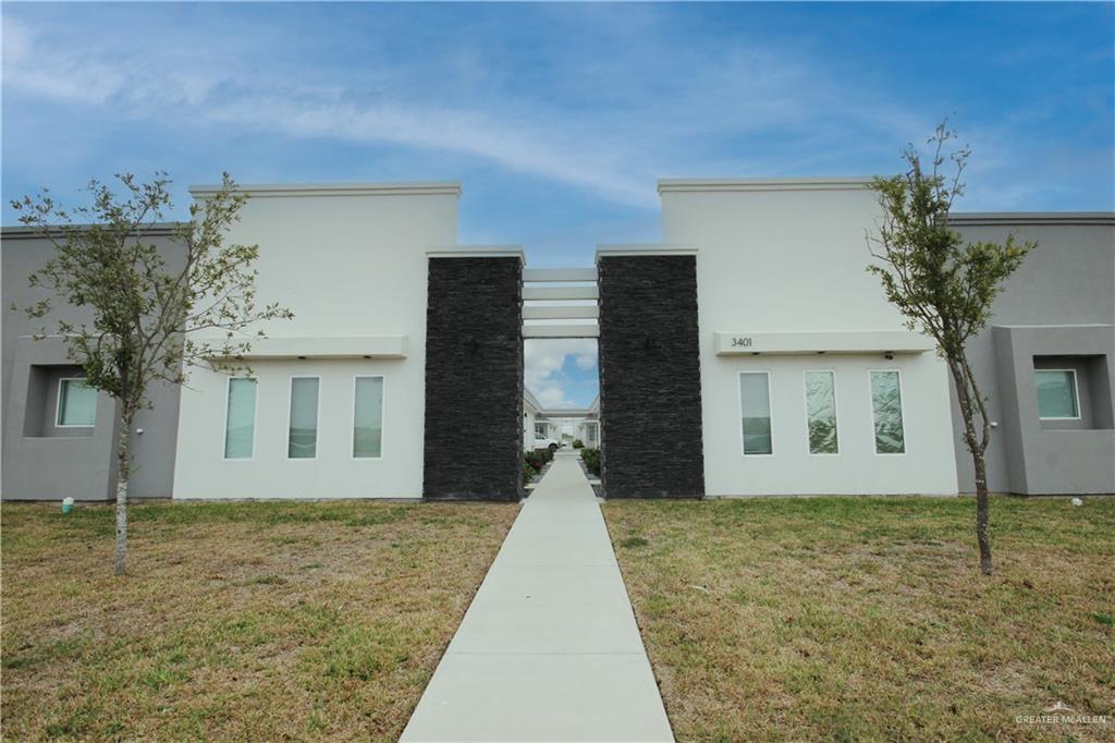 front view of a house with a yard