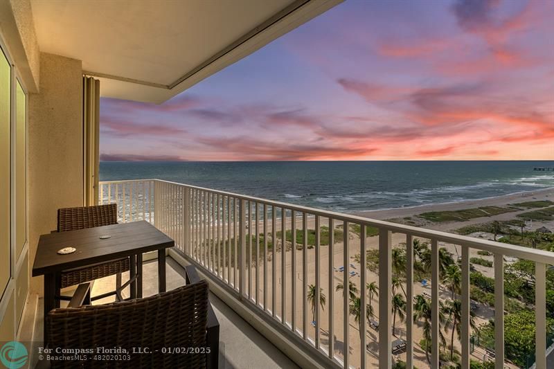 a view of a balcony with an outdoor space