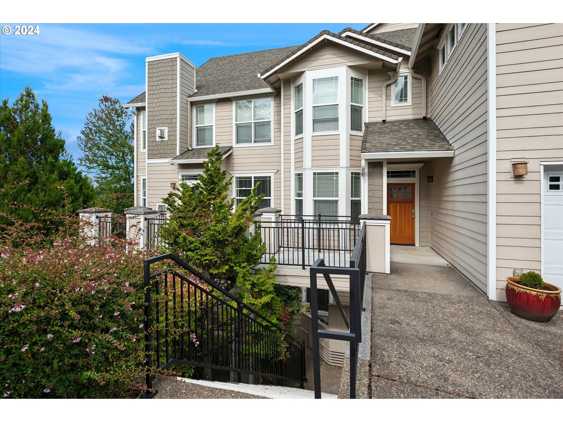 a front view of a house with balcony