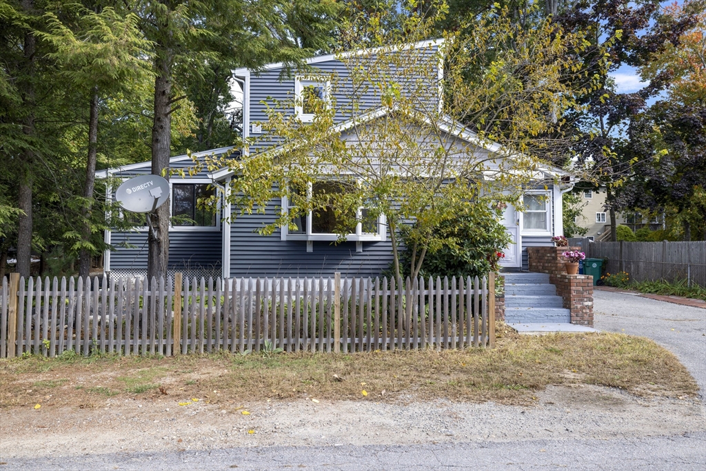 a front view of a house with a porch