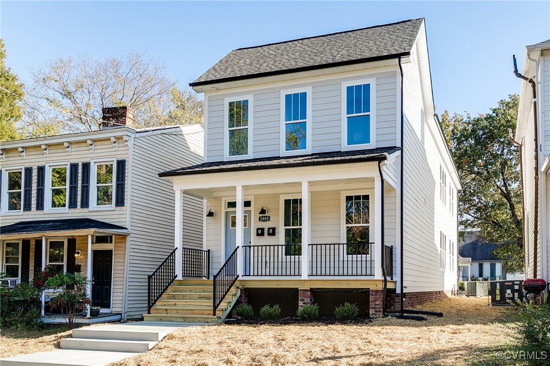 View of front of house with covered porch