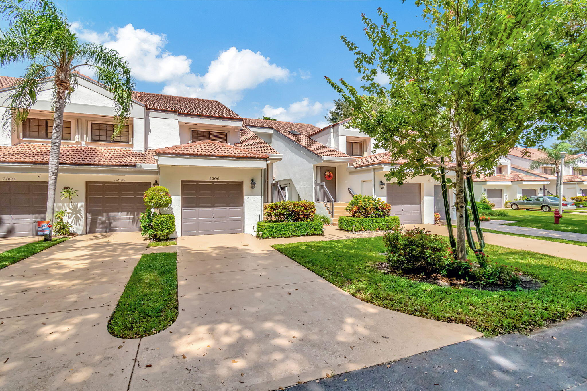 front view of a house with a yard