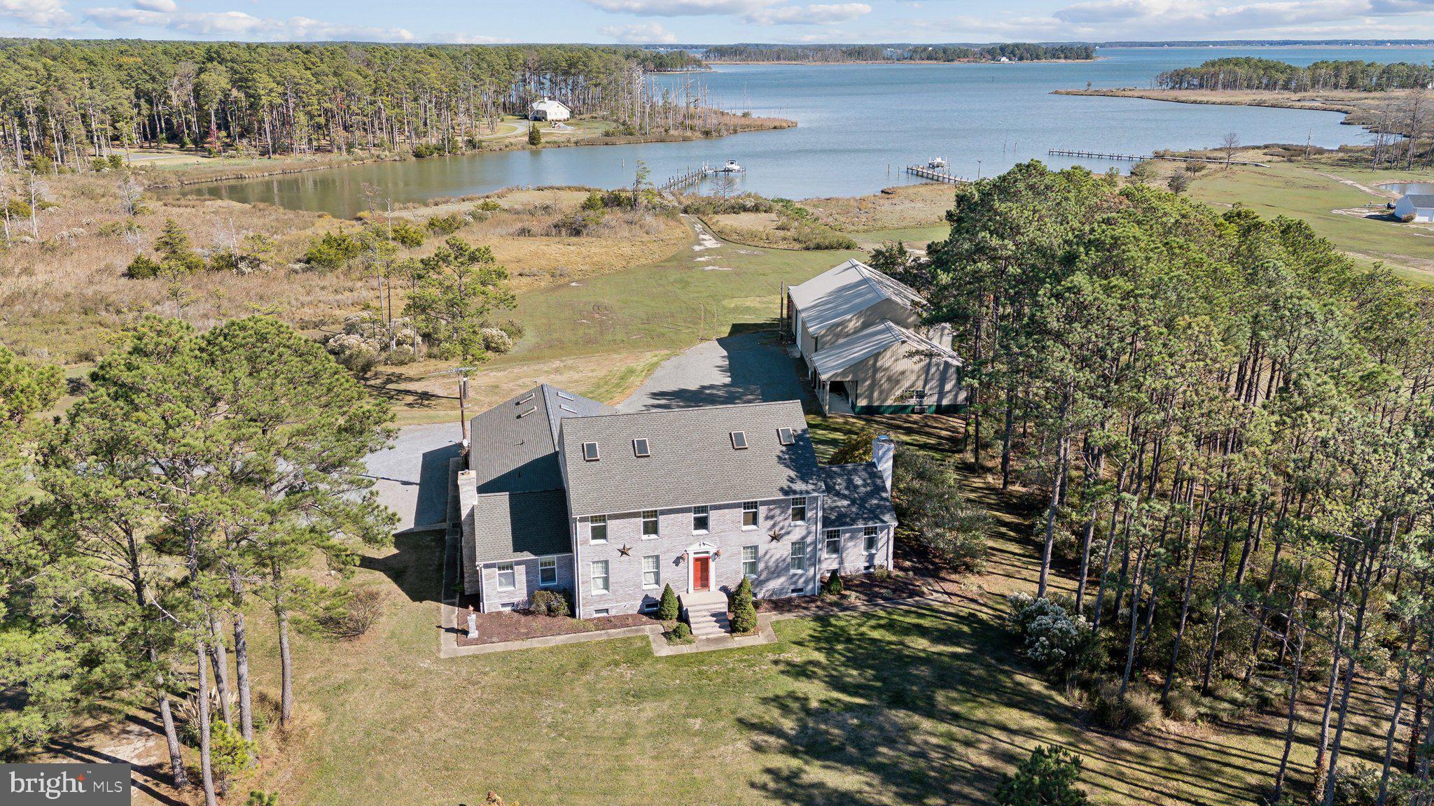 a aerial view of residential houses with outdoor space