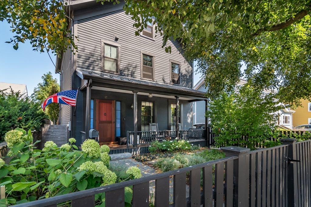 a front view of a house with a porch