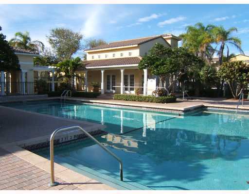 a view of a swimming pool with a patio