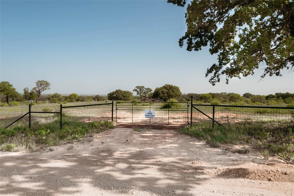 a view of a road with a yard