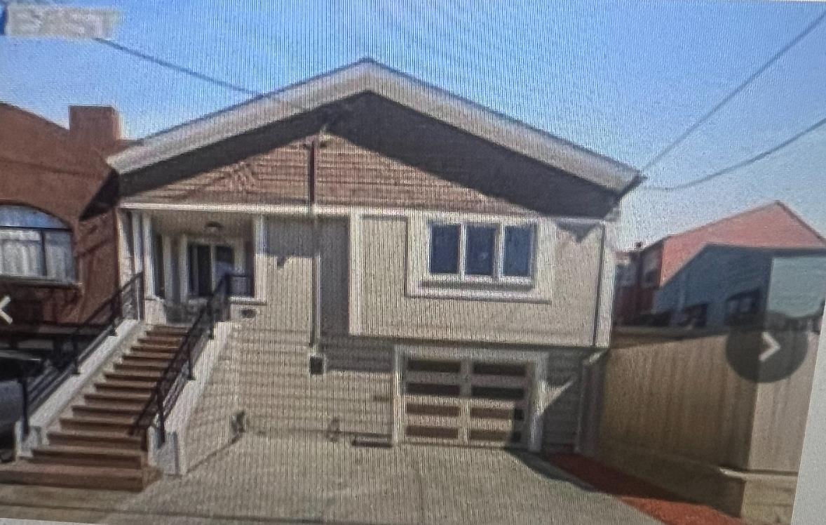 a front view of a house with a balcony