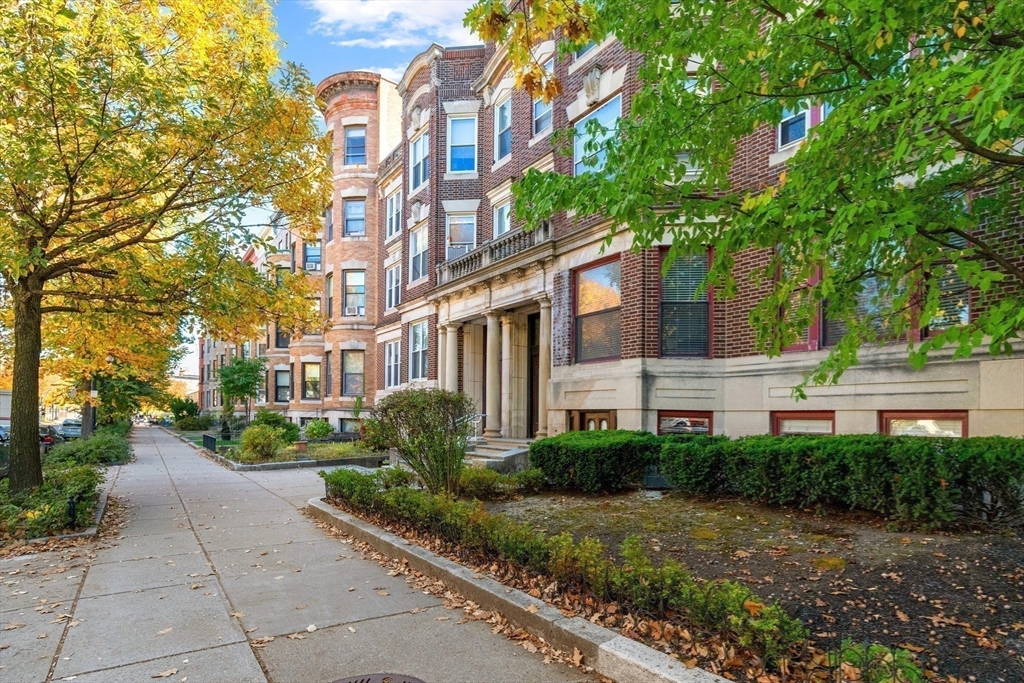 a view of a building with a garden