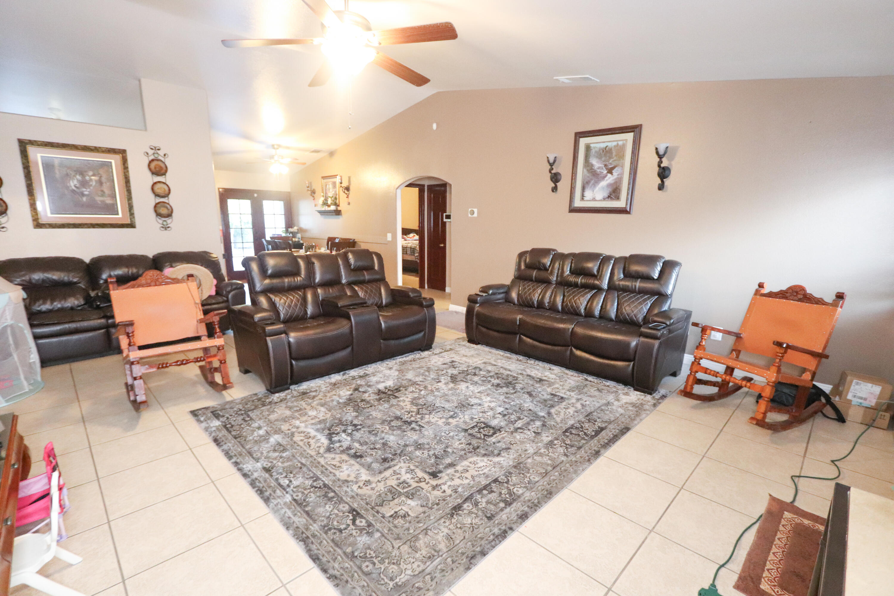 a living room with furniture and a couch